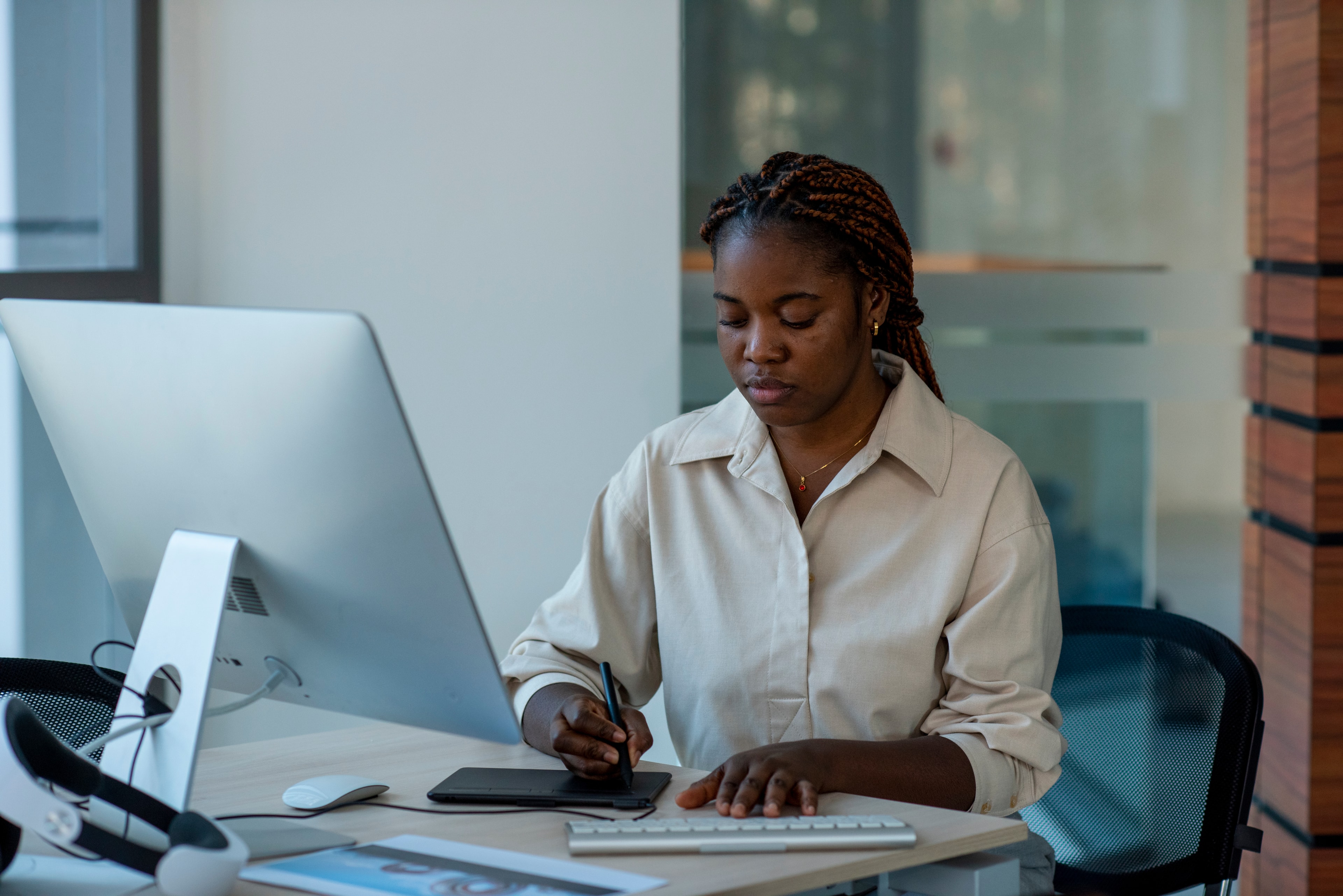 Professional woman working on tablet - Blue Sands STEM Labs partner